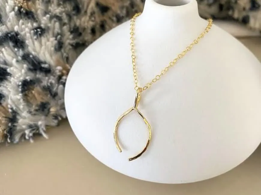 Gold wishbone pendant necklace for layering